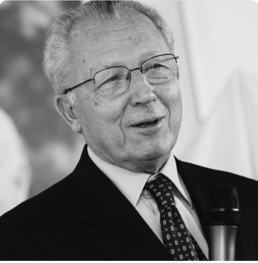 J. Delors